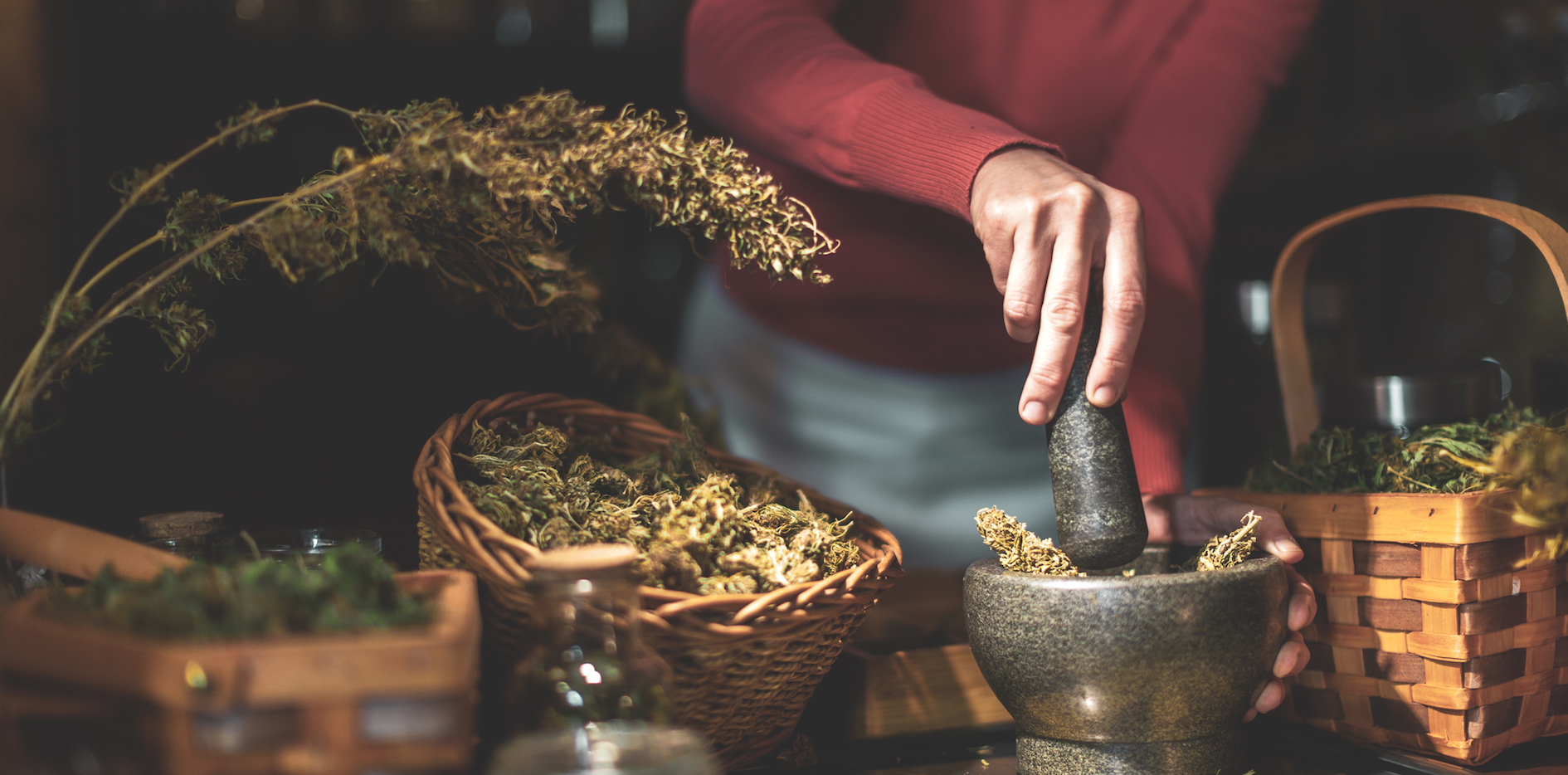 Grinding Dried Cannabis Buds With Mortar and Pestle GoAd Media